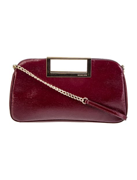 michael kors clutches for women|Michael Kors berkley clutch.